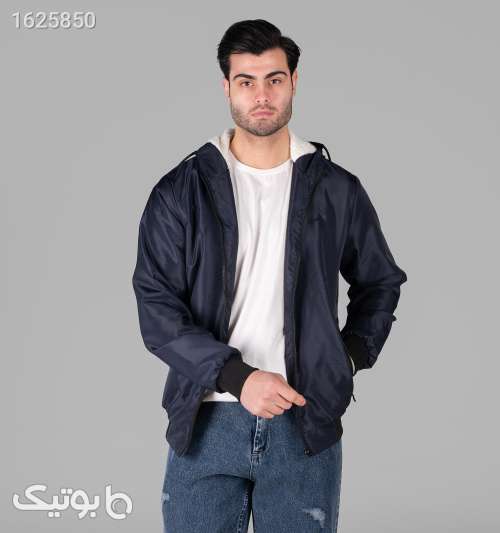 کاپشن مردانه بادگیر سرمه‌ای مموری کلاه‌دار جیب زیپی سورمه ای 05 2026