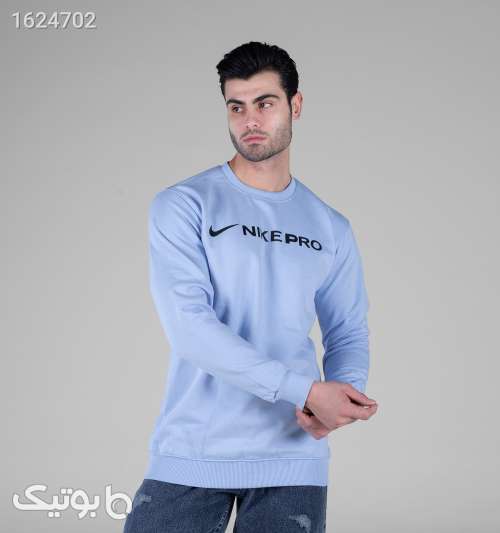 بلوز دورس مردانه طرح‌دار نایک یقه گرد اسپان آبی روشن Ø¢Ø¨ÛŒ Ú©Ù…Ø±Ù†Ú¯ 05 2026